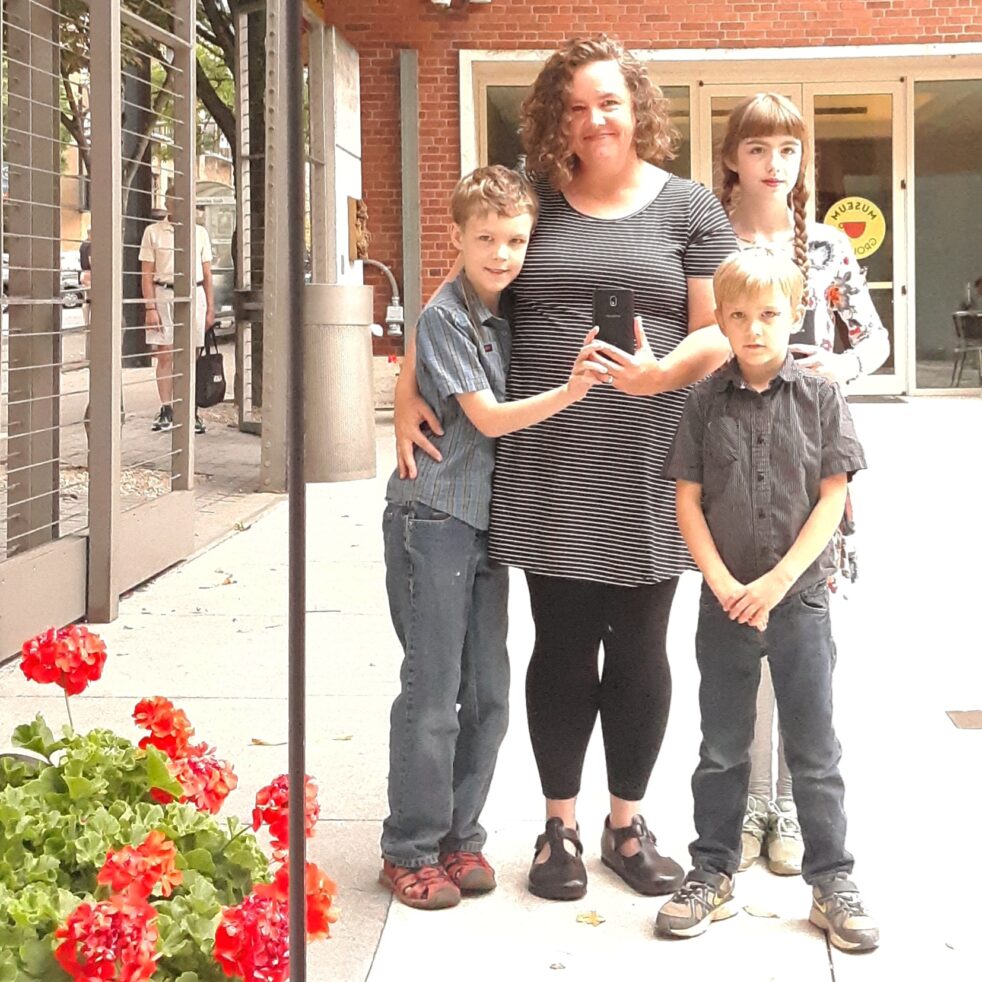 Woman and children at art galery